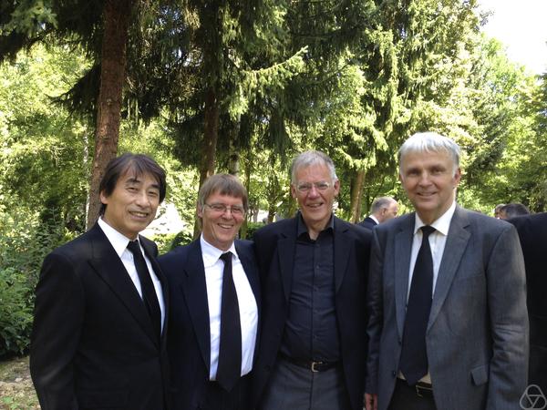 Kyoji Saito, Gert-Martin Greuel, Dieter Vohmann, Helmut Arend Hamm